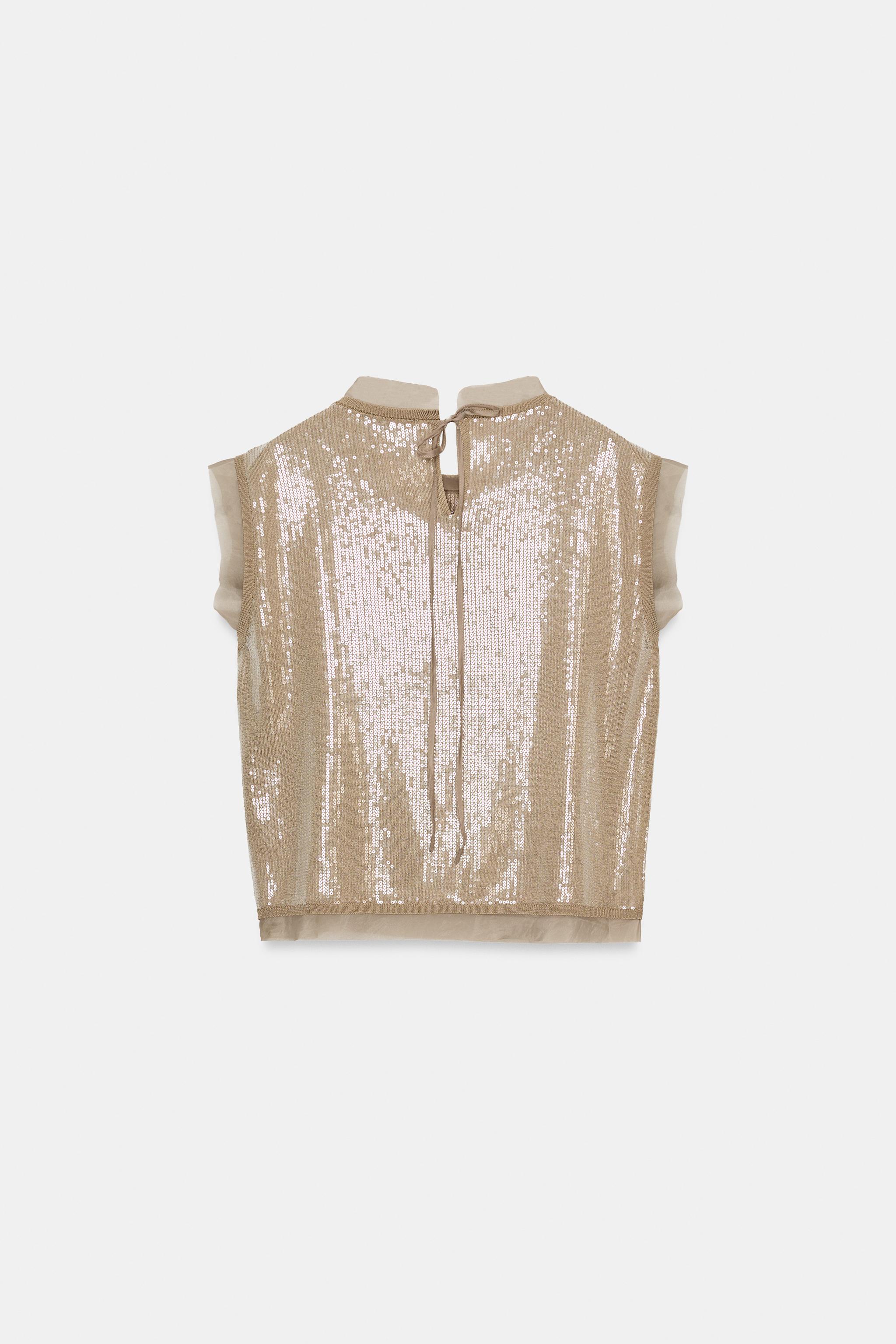 TOP EN MAILLE ET PAILLETTES